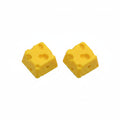 Cheese 3D printed yellow keycap on white keyboard