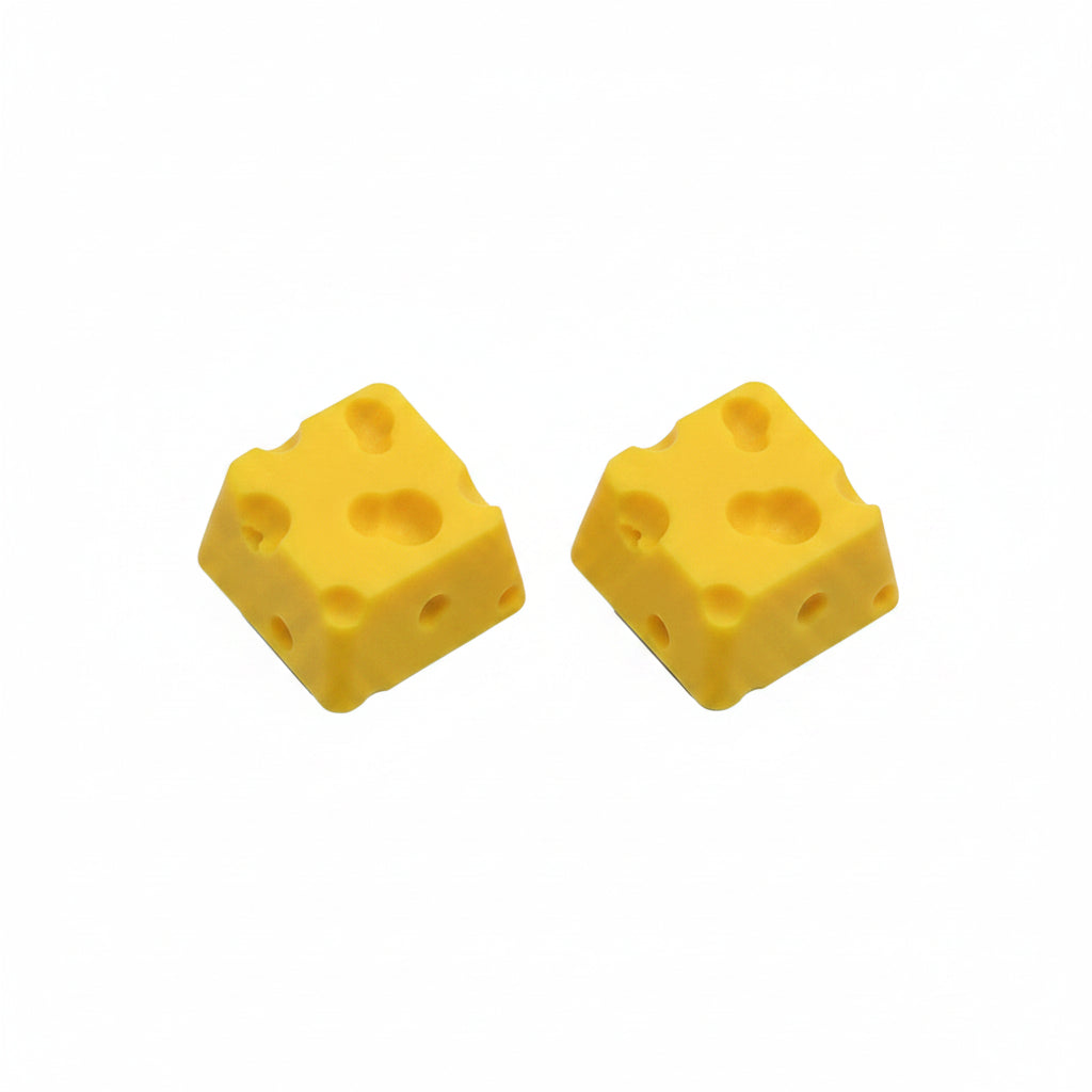 Cheese 3D printed yellow keycap on white keyboard