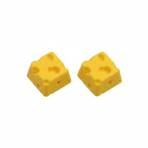 Cheese 3D printed yellow keycap on white keyboard